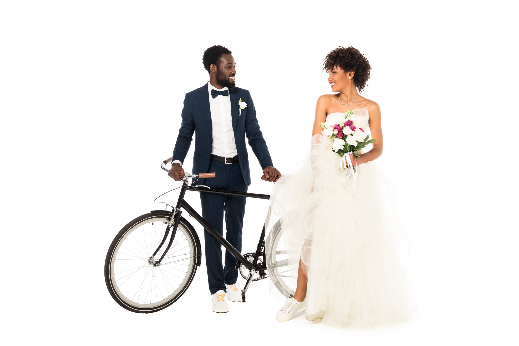 Happy couple posing with a bicycle