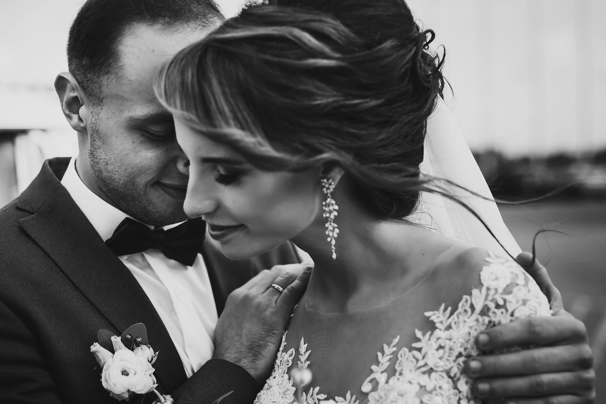 Bride and groom in a classic wedding-day embrace