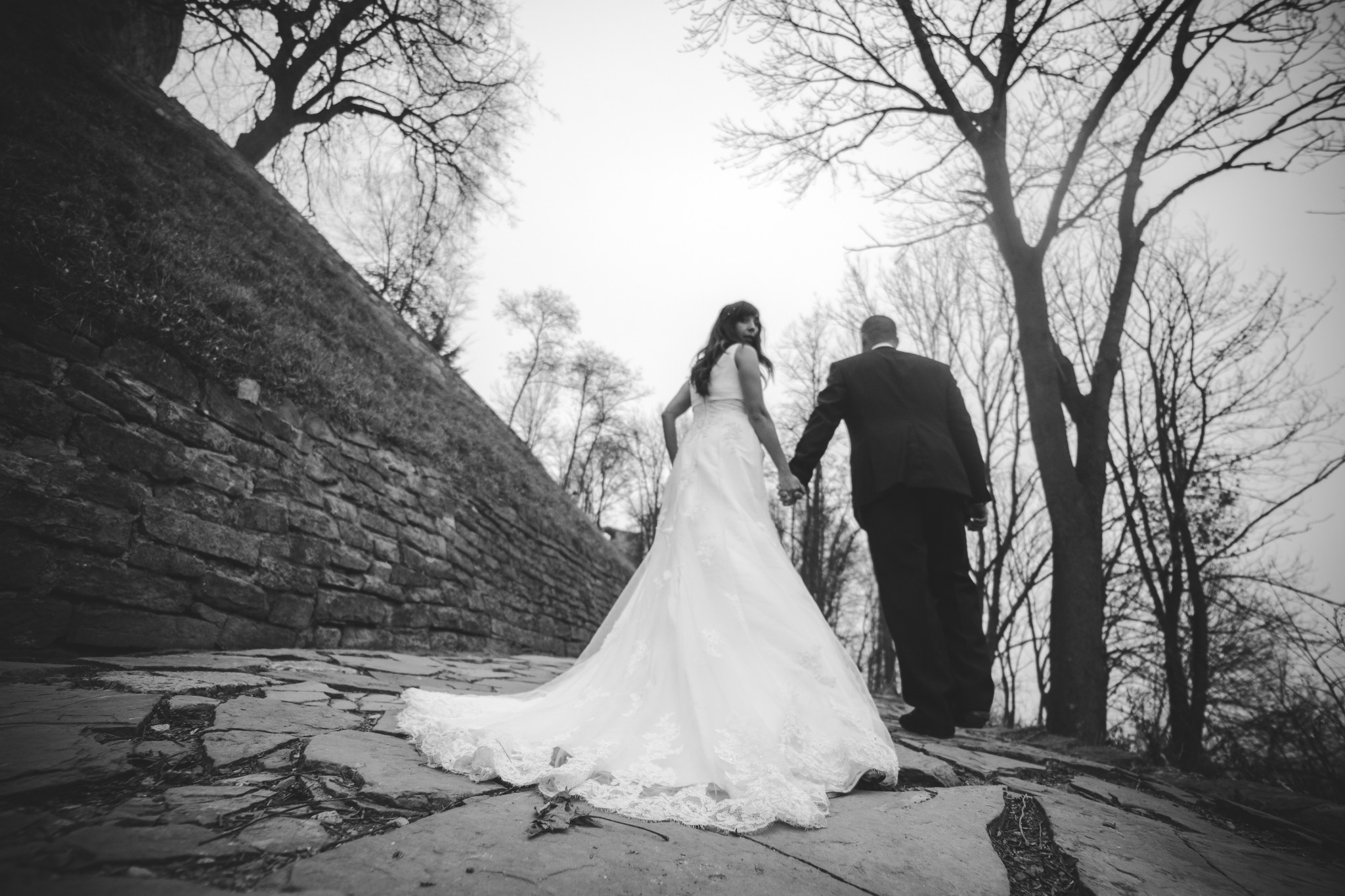 Newlyweds walking hand in hand