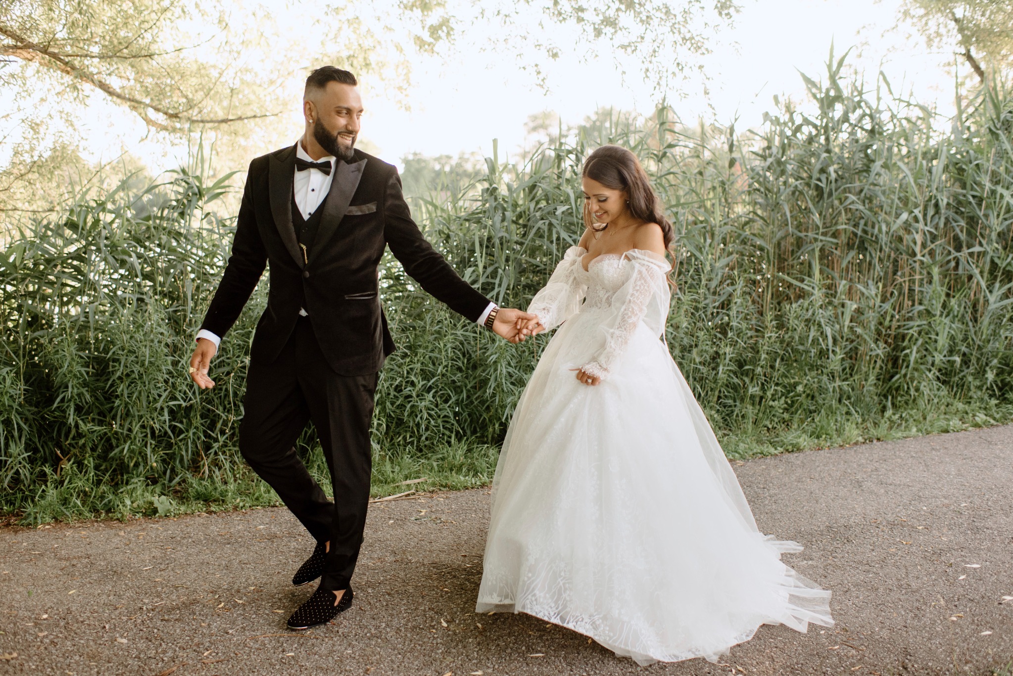 Couple walking hand in hand in nature