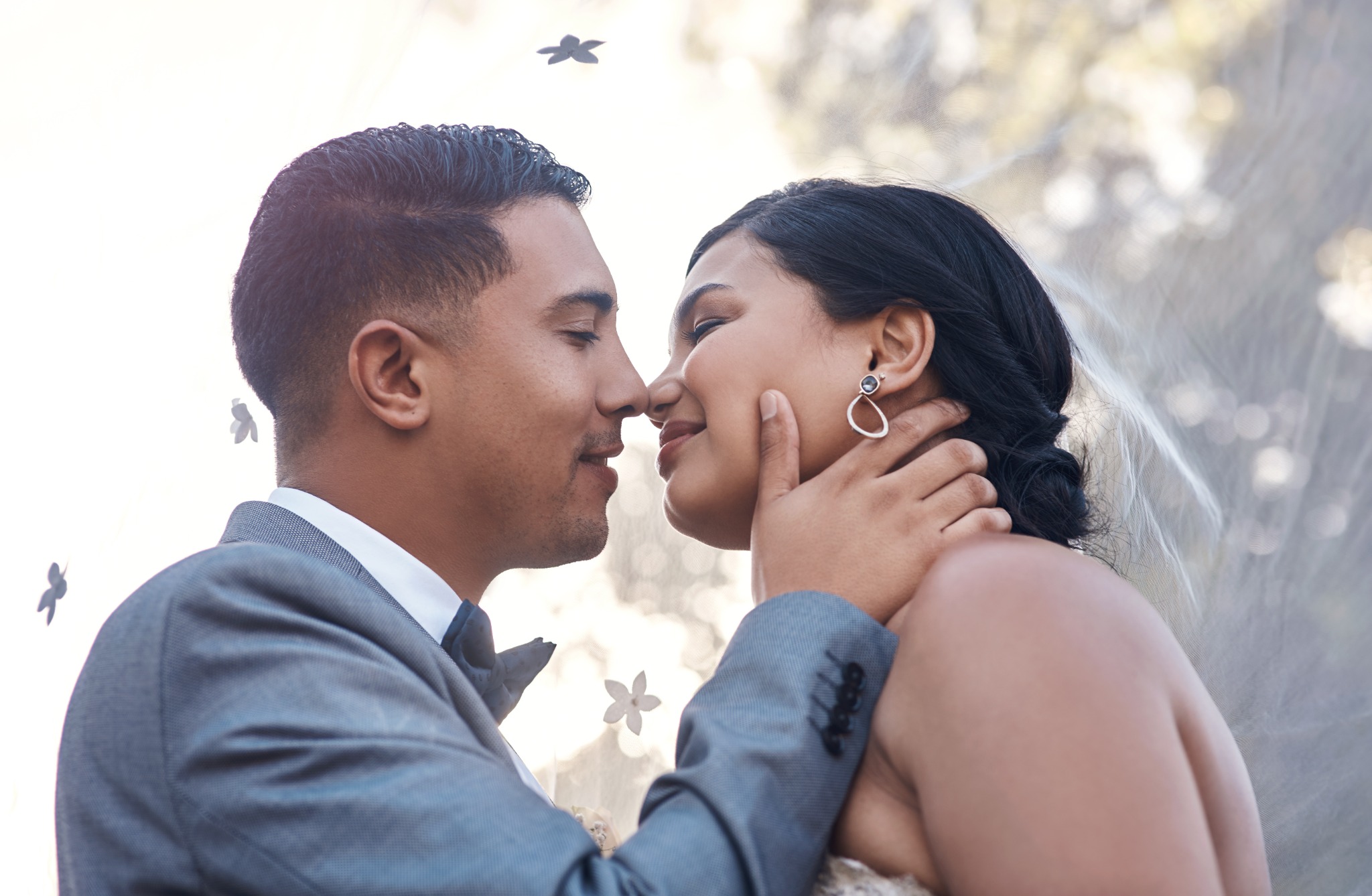 Happy wedding couple sharing a tender moment